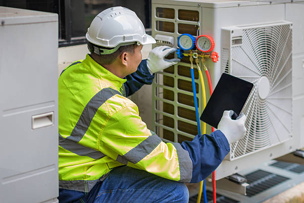 Professional Heat Pump Repair technician working in Brinklow, MD